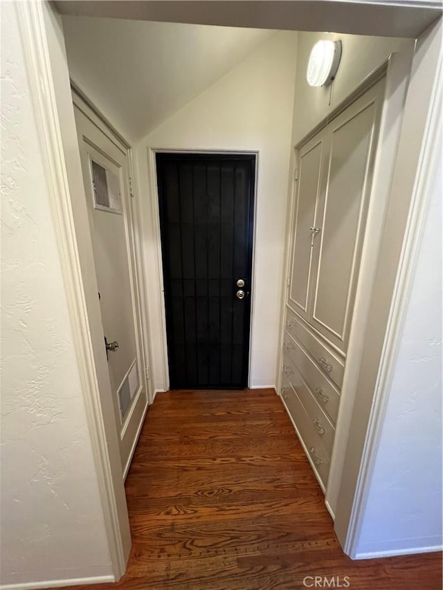 1465 N Euclid Ave, Upland, CA 91786 - hall with dark wood-style floors, vaulted ceiling, and baseboards