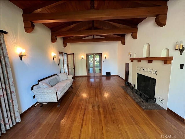 1465 N Euclid Ave, Upland, CA 91786 - living area with wood finished floors, a fireplace, french doors, wood ceiling, and baseboards