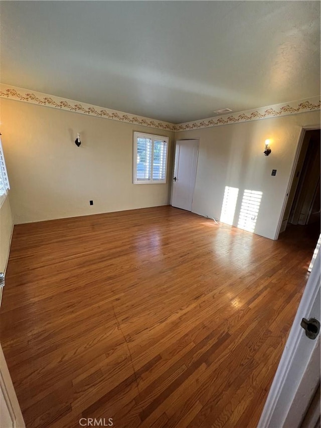 1465 N Euclid Ave, Upland, CA 91786 - spare room featuring wood finished floors