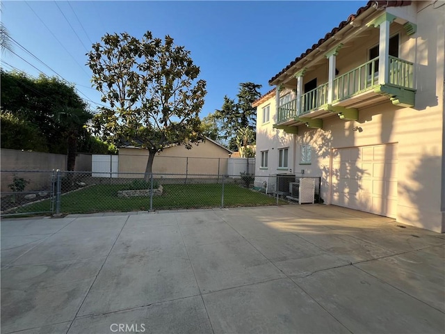 1465 N Euclid Ave, Upland, CA 91786 - view of patio featuring a balcony and driveway
