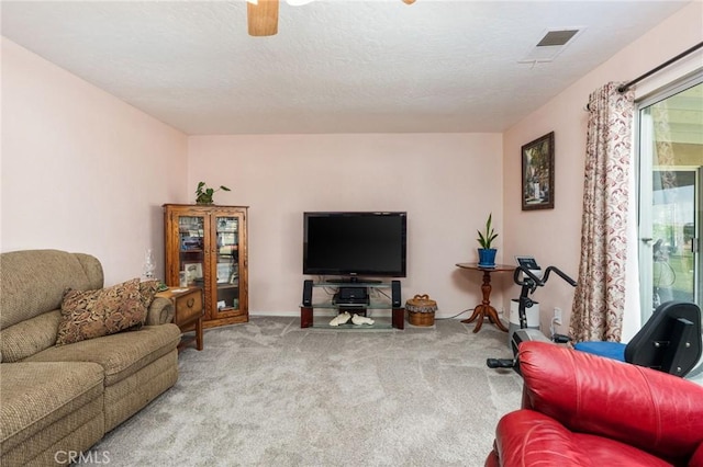 3298 N Zediker Ave, Sanger, CA 93657 - carpeted living area with ceiling fan