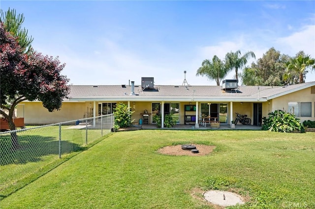3298 N Zediker Ave, Sanger, CA 93657 - rear view of house with a patio, a fire pit, and stucco siding