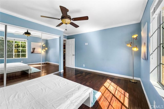 1535 S Bentley Ave Unit 202, Los Angeles, CA 90025 - bedroom with baseboards, wood finished floors, a closet, ceiling fan, and crown molding
