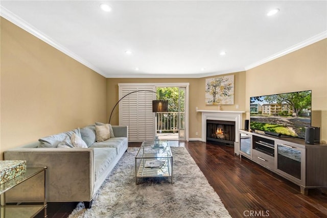1535 S Bentley Ave Unit 202, Los Angeles, CA 90025 - living room with ornamental molding, dark wood-type flooring, a lit fireplace, recessed lighting, and baseboards