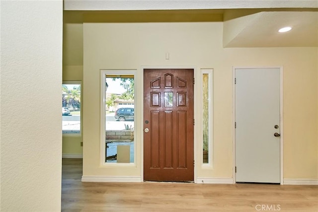 13855 Calada Dr, Moreno Valley, CA 92553 - entryway with wood finished floors and baseboards
