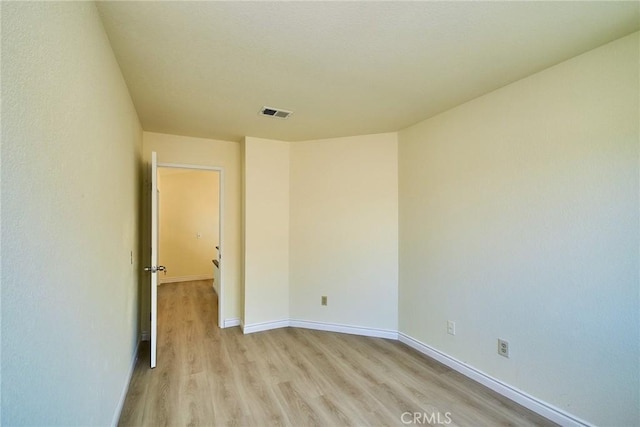 13855 Calada Dr, Moreno Valley, CA 92553 - spare room with light wood-style flooring and baseboards