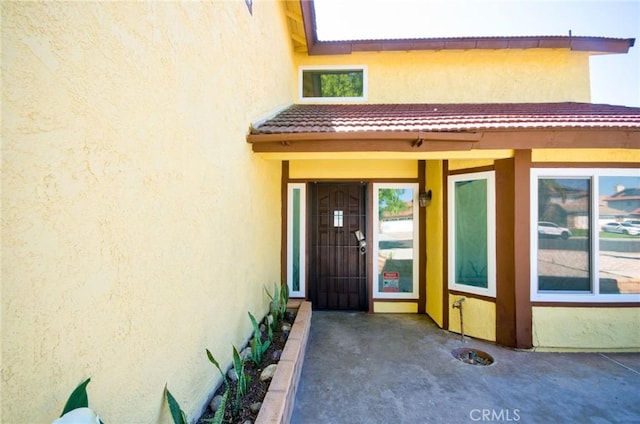13855 Calada Dr, Moreno Valley, CA 92553 - entrance to property featuring stucco siding