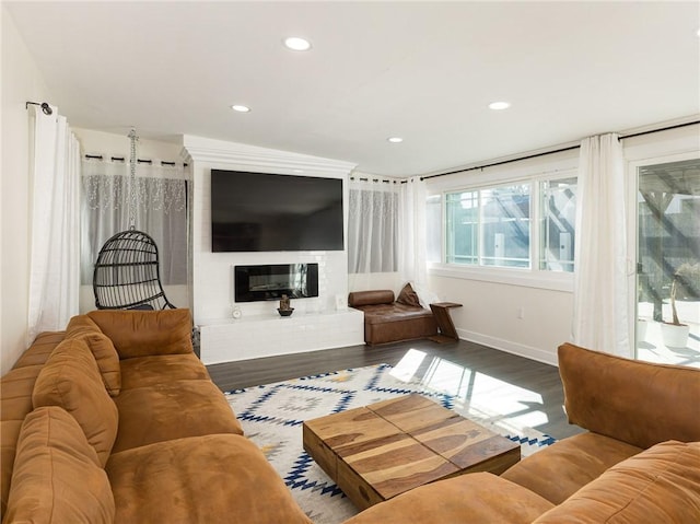 5518 W 117th St, Hawthorne, CA 90304 - living room featuring a glass covered fireplace, wood finished floors, baseboards, and recessed lighting