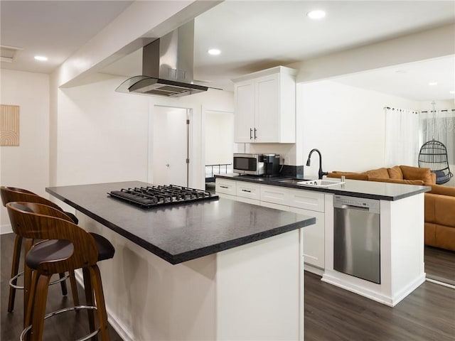 5518 W 117th St, Hawthorne, CA 90304 - kitchen with stainless steel appliances, a sink, dark countertops, dark wood finished floors, and recessed lighting