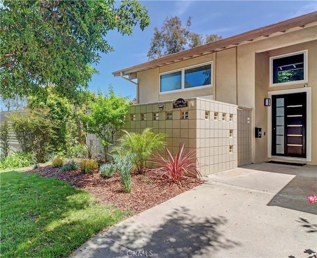 259 Calle Aragon Unit A, Laguna Woods, CA 92637 - entrance to property with stucco siding