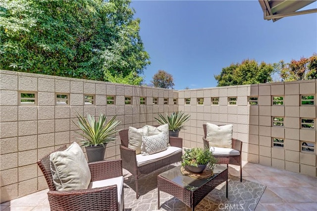 259 Calle Aragon Unit A, Laguna Woods, CA 92637 - view of patio with an outdoor hangout area