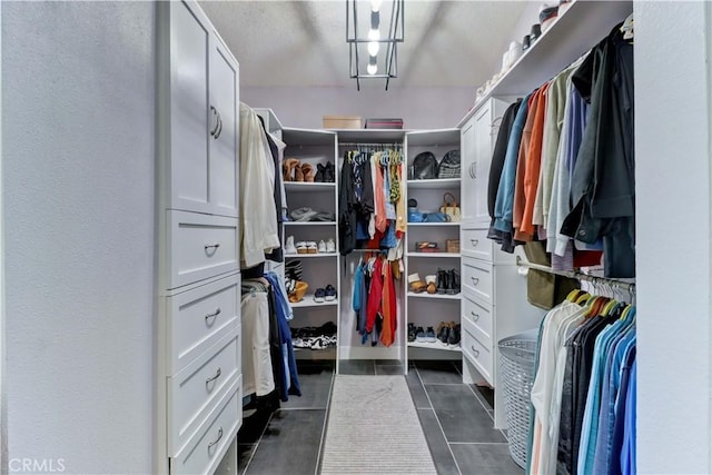 259 Calle Aragon Unit A, Laguna Woods, CA 92637 - spacious closet featuring dark tile patterned flooring