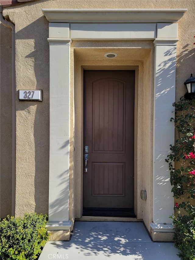 327 Paseo Gusto Unit 155, Palm Desert, CA 92211 - view of exterior entry with stucco siding