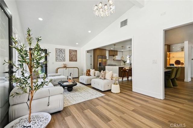 4816 Saint Andrews Ave, Buena Park, CA 90621 - living area featuring high vaulted ceiling, light wood-style flooring, recessed lighting, a chandelier, and beamed ceiling