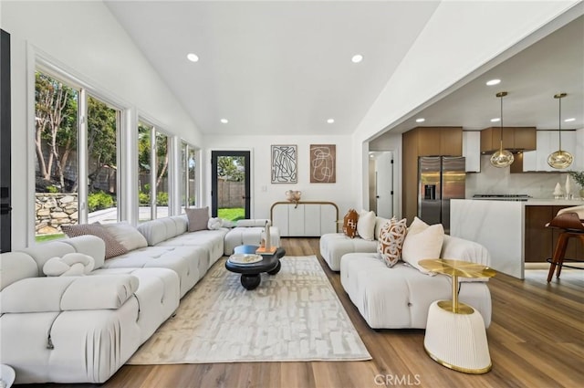 4816 Saint Andrews Ave, Buena Park, CA 90621 - living room featuring recessed lighting, wood finished floors, and vaulted ceiling