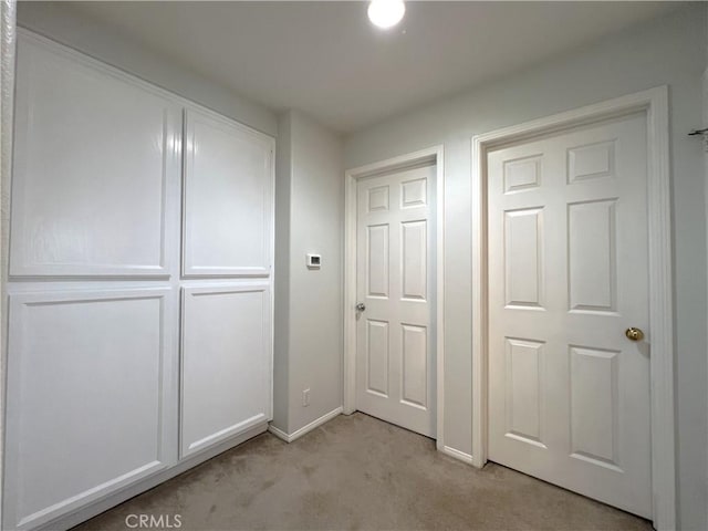 1729 Sunflower Ave Unit A, Glendora, CA 91740 - corridor featuring light colored carpet and baseboards