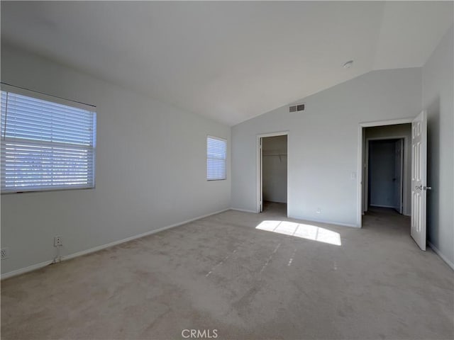 1729 Sunflower Ave Unit A, Glendora, CA 91740 - unfurnished bedroom featuring vaulted ceiling, light carpet, and baseboards