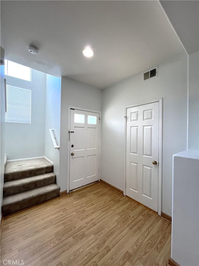1729 Sunflower Ave Unit A, Glendora, CA 91740 - foyer with light wood finished floors, stairway, baseboards, and recessed lighting