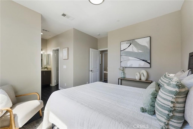 168 N Orange Ave, Brea, CA 92821 - bedroom with wood finished floors, baseboards, and ensuite bathroom
