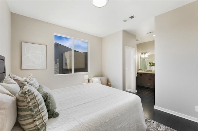 168 N Orange Ave, Brea, CA 92821 - bedroom featuring dark wood-type flooring, baseboards, and ensuite bathroom