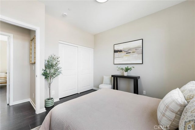 168 N Orange Ave, Brea, CA 92821 - bedroom featuring dark wood-type flooring, baseboards, and a closet