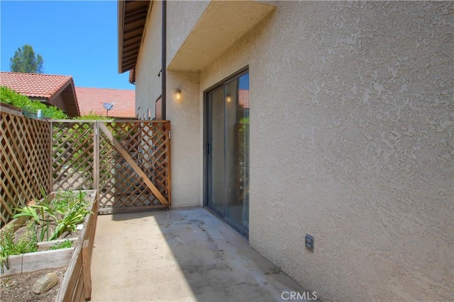 5303 State Highway 49 N Unit 14, Mariposa, CA 95338 - view of exterior entry with stucco siding and a gate