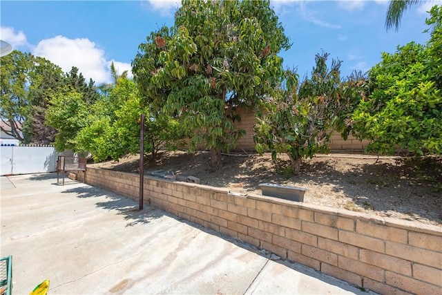 13150 Stern Ave, La Mirada, CA 90638 - fenced backyard featuring a patio area