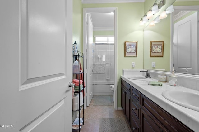 4003 Galapagos Way, Oxnard, CA 93035 - bathroom with double vanity, toilet, tile patterned flooring, combined bath / shower with glass door, and crown molding