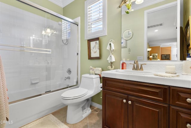4003 Galapagos Way, Oxnard, CA 93035 - full bathroom featuring vanity, tile patterned floors, enclosed tub / shower combo, toilet, and crown molding