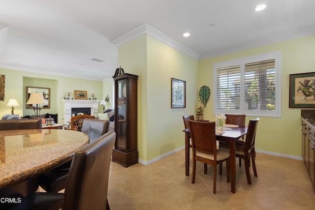4003 Galapagos Way, Oxnard, CA 93035 - dining area with ornamental molding, baseboards, recessed lighting, light tile patterned flooring, and a fireplace