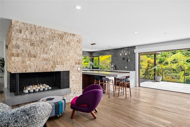 1435 Cerritos Dr, Laguna Beach, CA 92651 - living area with light wood-style flooring, a fireplace, and recessed lighting