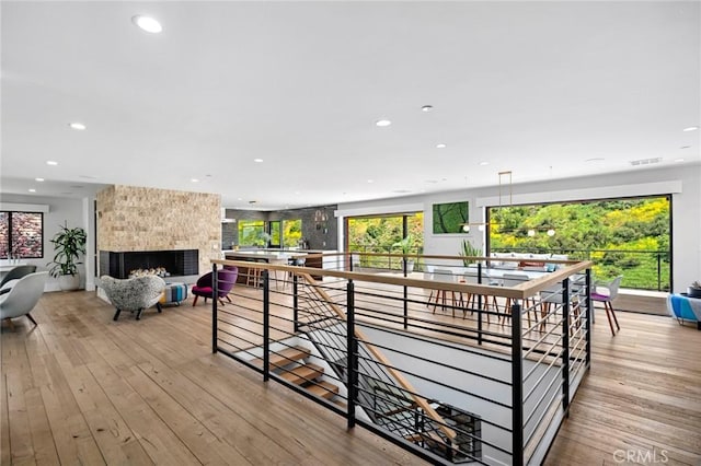1435 Cerritos Dr, Laguna Beach, CA 92651 - living area with recessed lighting, a fireplace, hardwood / wood-style floors, and plenty of natural light