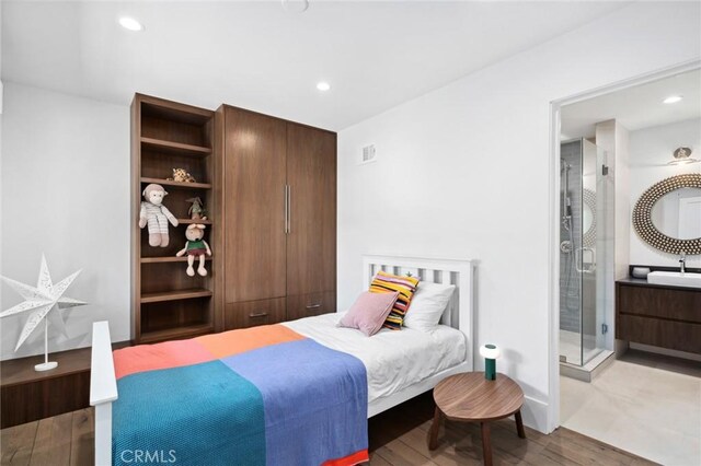 1435 Cerritos Dr, Laguna Beach, CA 92651 - bedroom with wood finished floors, a sink, and recessed lighting