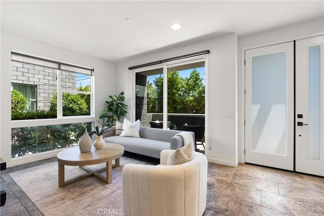 645 Channel Way, Costa Mesa, CA 92627 - living area featuring baseboards, recessed lighting, and stone tile flooring