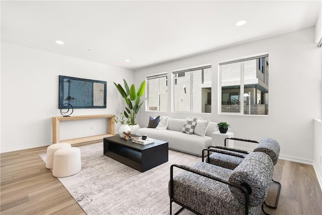 645 Channel Way, Costa Mesa, CA 92627 - living room featuring wood finished floors, plenty of natural light, baseboards, and recessed lighting