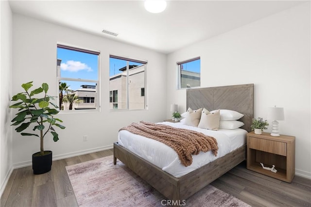 645 Channel Way, Costa Mesa, CA 92627 - bedroom with wood finished floors and baseboards