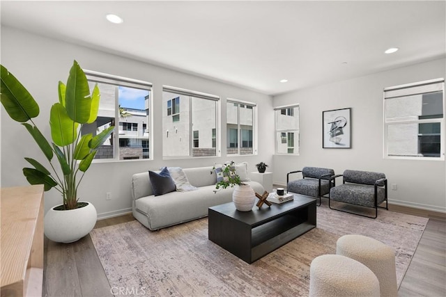 645 Channel Way, Costa Mesa, CA 92627 - living area with wood finished floors, baseboards, and recessed lighting