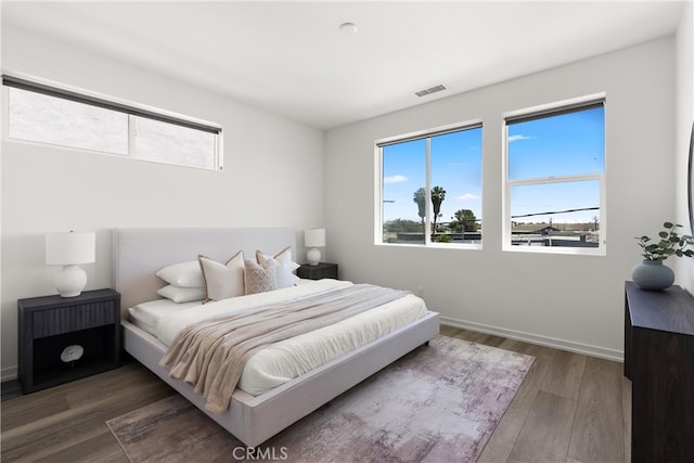 645 Channel Way, Costa Mesa, CA 92627 - bedroom featuring wood finished floors and baseboards