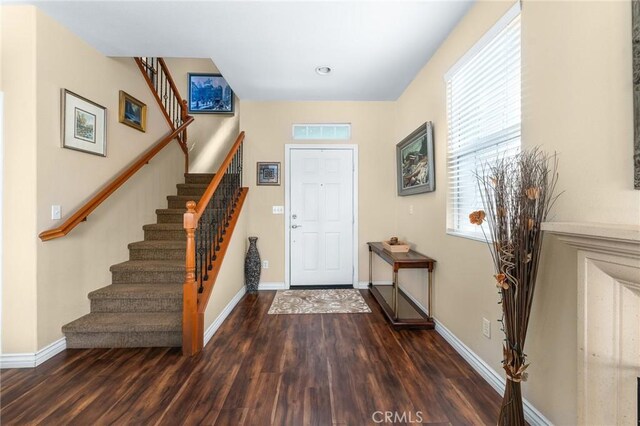 35509 Trevino Trl, Beaumont, CA 92223 - foyer featuring stairway, wood finished floors, and baseboards