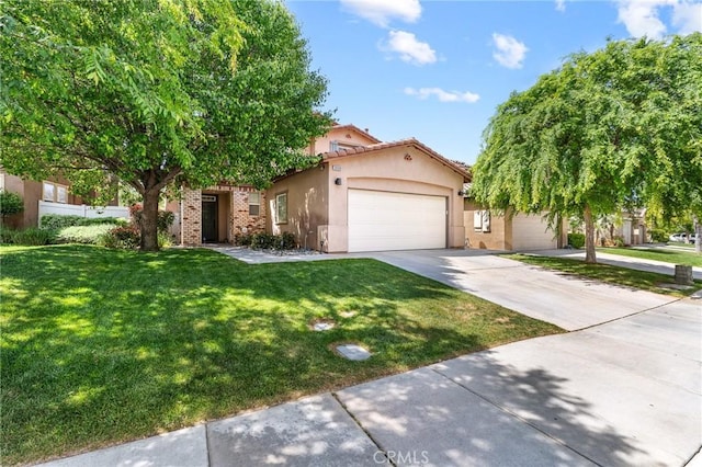 35509 Trevino Trl, Beaumont, CA 92223 - view of front of home featuring a garage, driveway, a front lawn, stucco siding, and a tile roof