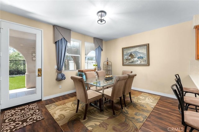 35509 Trevino Trl, Beaumont, CA 92223 - dining area with dark wood-style flooring and baseboards