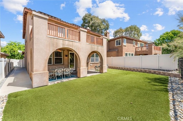 35509 Trevino Trl, Beaumont, CA 92223 - rear view of property with a balcony, a patio, and stucco siding