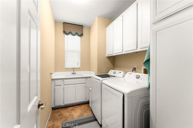 35509 Trevino Trl, Beaumont, CA 92223 - laundry room with independent washer and dryer, cabinet space, and light tile patterned flooring
