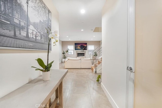 11023 Fruitland Dr Unit 104, Studio City, CA 91604 - hallway with light tile patterned floors and recessed lighting
