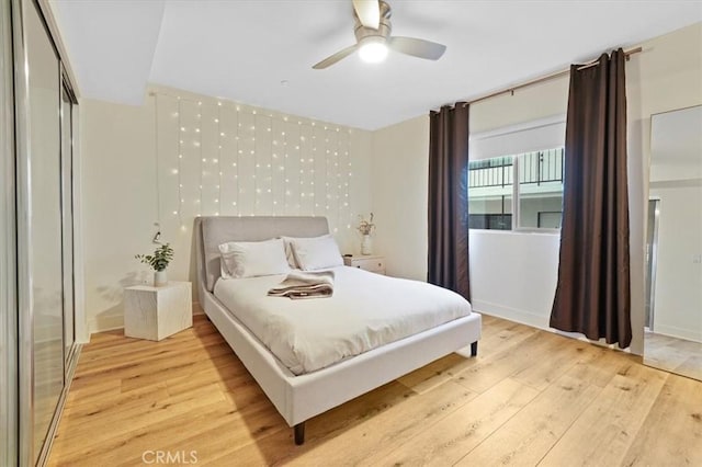 11023 Fruitland Dr Unit 104, Studio City, CA 91604 - bedroom with light wood finished floors and a ceiling fan