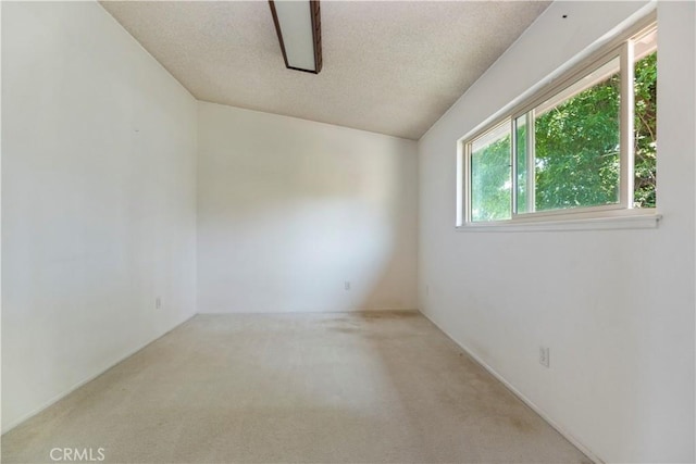 6164 Amberwood Dr, Rancho Cucamonga, CA 91701 - carpeted empty room featuring a textured ceiling