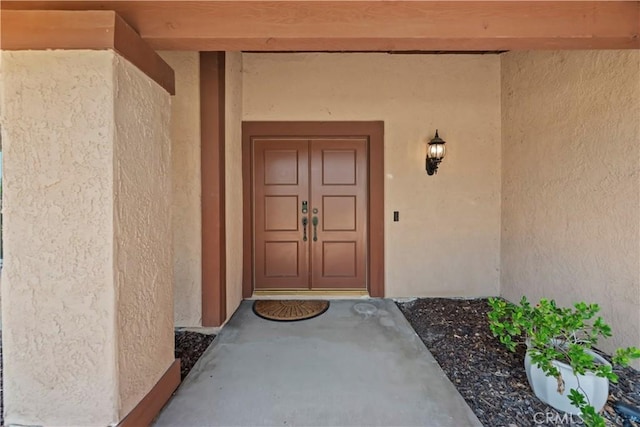 6164 Amberwood Dr, Rancho Cucamonga, CA 91701 - doorway to property with stucco siding