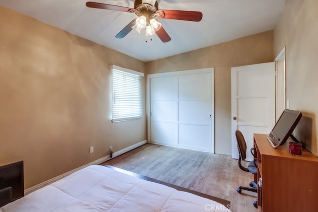 327 S 35th St, San Diego, CA 92113 - bedroom featuring wood finished floors, an office area, ceiling fan, a closet, and baseboards