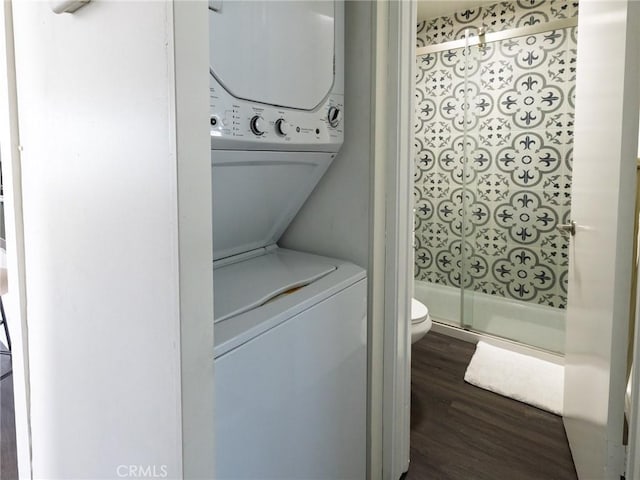 5512 W 117th St, Hawthorne, CA 90304 - washroom featuring stacked washer / drying machine and dark wood finished floors