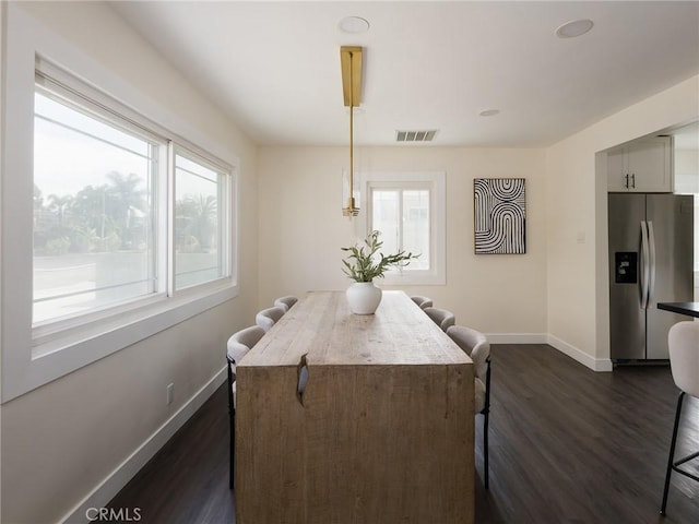 5512 W 117th St, Hawthorne, CA 90304 - dining room with baseboards and dark wood finished floors